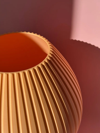 Vase Liv in peach in einen closeup 
